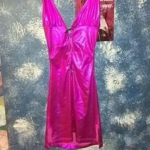 Shiny pink open backed mini dress